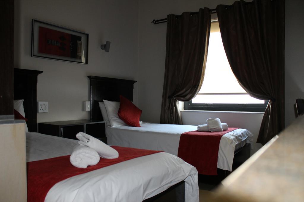 Alcazaba Hotel Johannesburg Bagian luar foto
